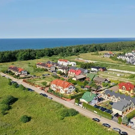Comfortable Wooden Homes Near The Dom wakacyjny Grzybowo (West Pomeranian)